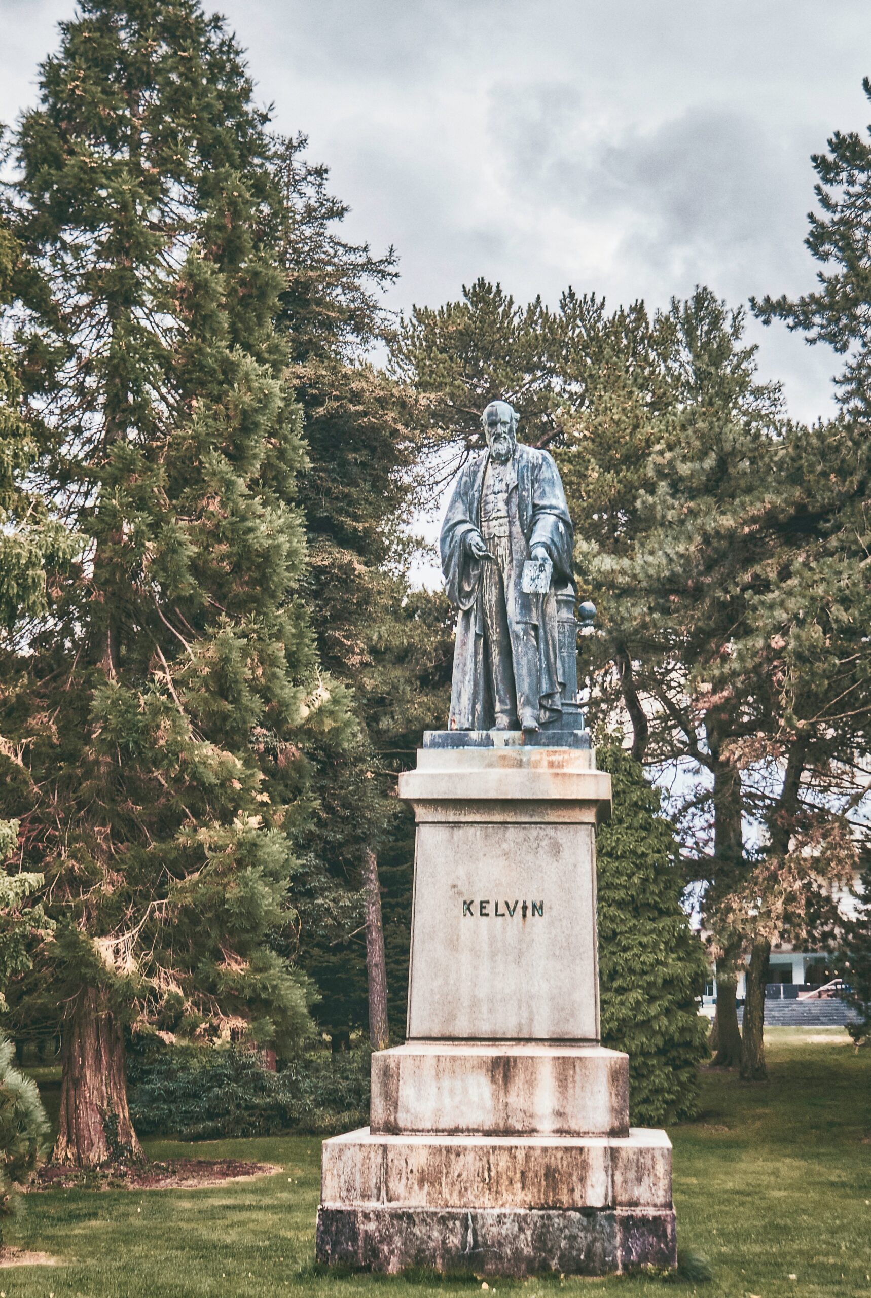 statue of man in black coat